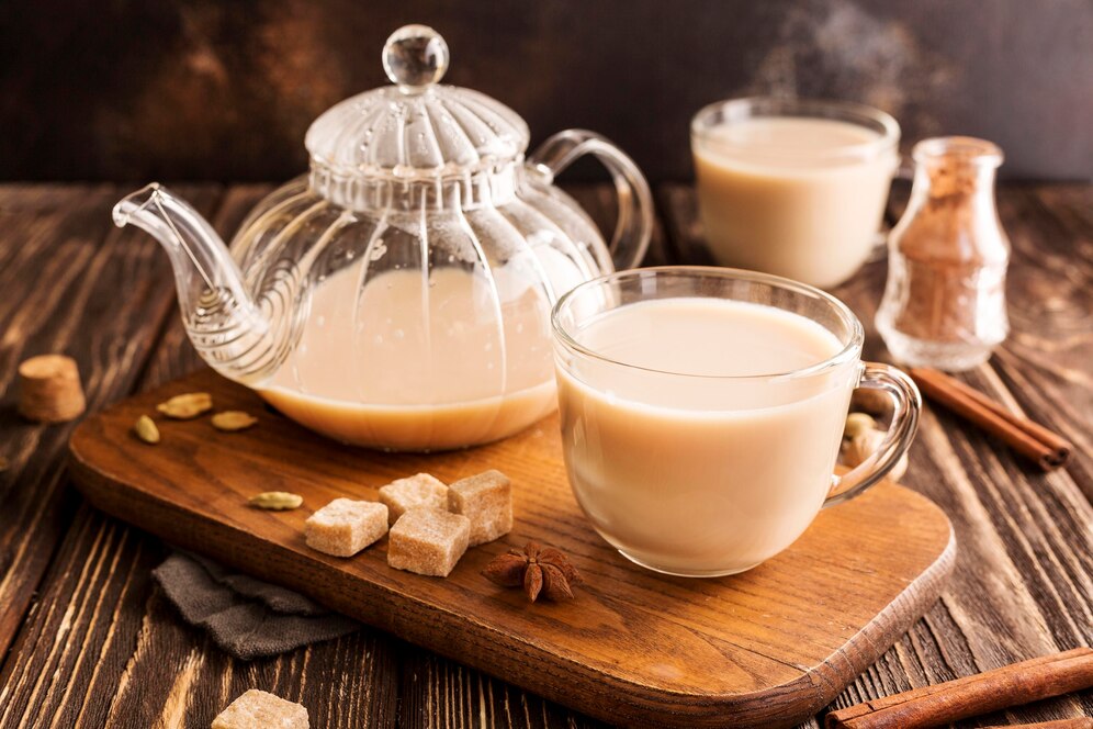 front-view-milk-tea-concept-with-cinnamon_23-2148555194.jpg
