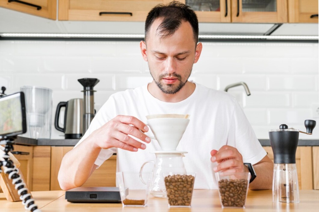 front-view-man-making-coffee_23-2148551567.jpg