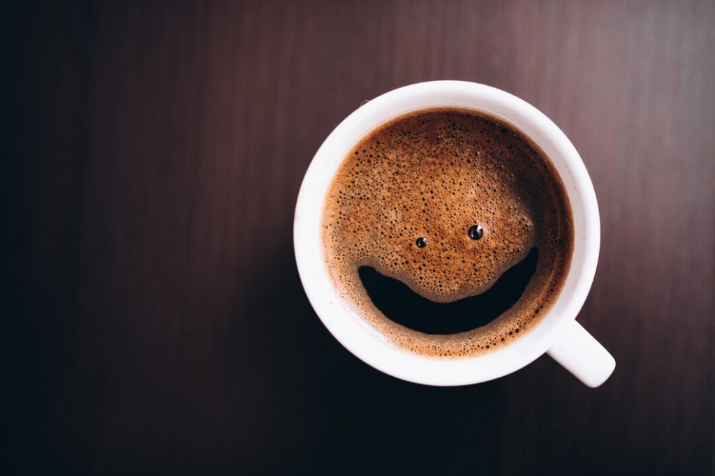 cup-coffee-with-foam-smile-face-desk-isolated_1303-18307.jpg