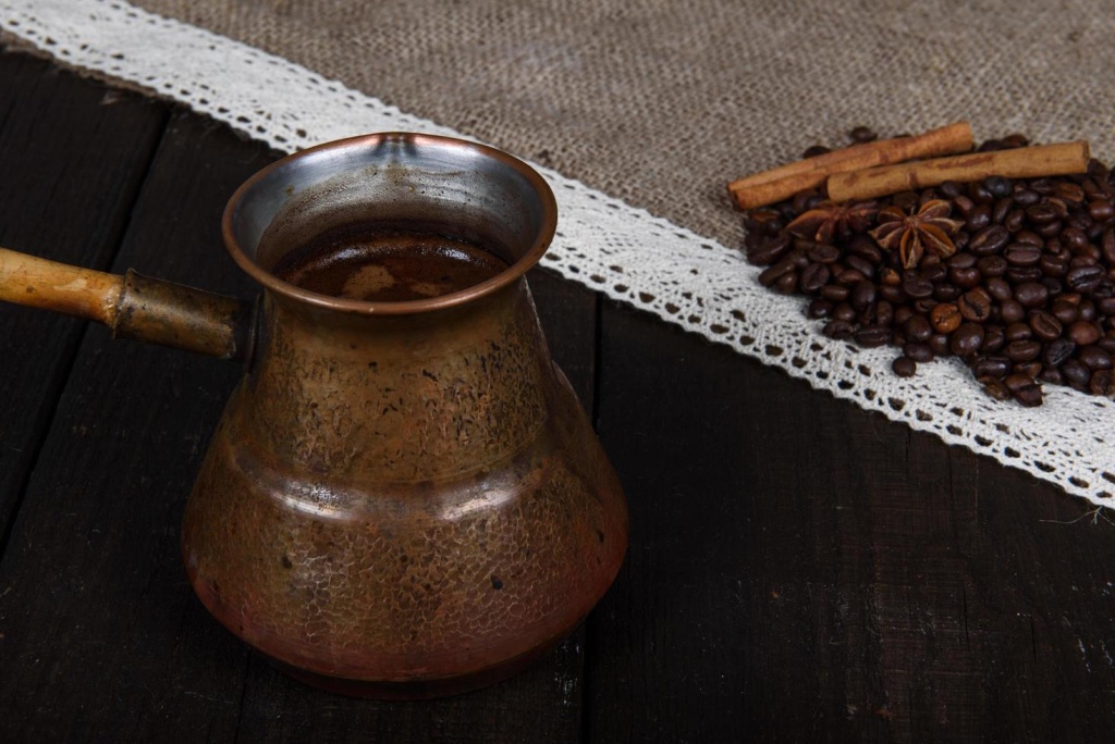 black-coffee-with-grains-and-cinnamon-free-photo.jpg