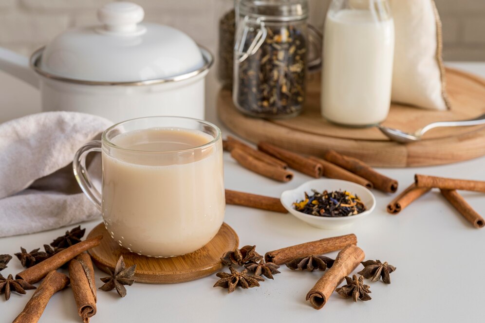 tea-with-milk-cinnamon_23-2148550535.jpg